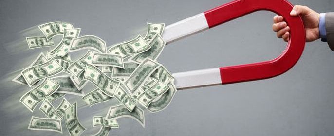 dollar bills being magnet